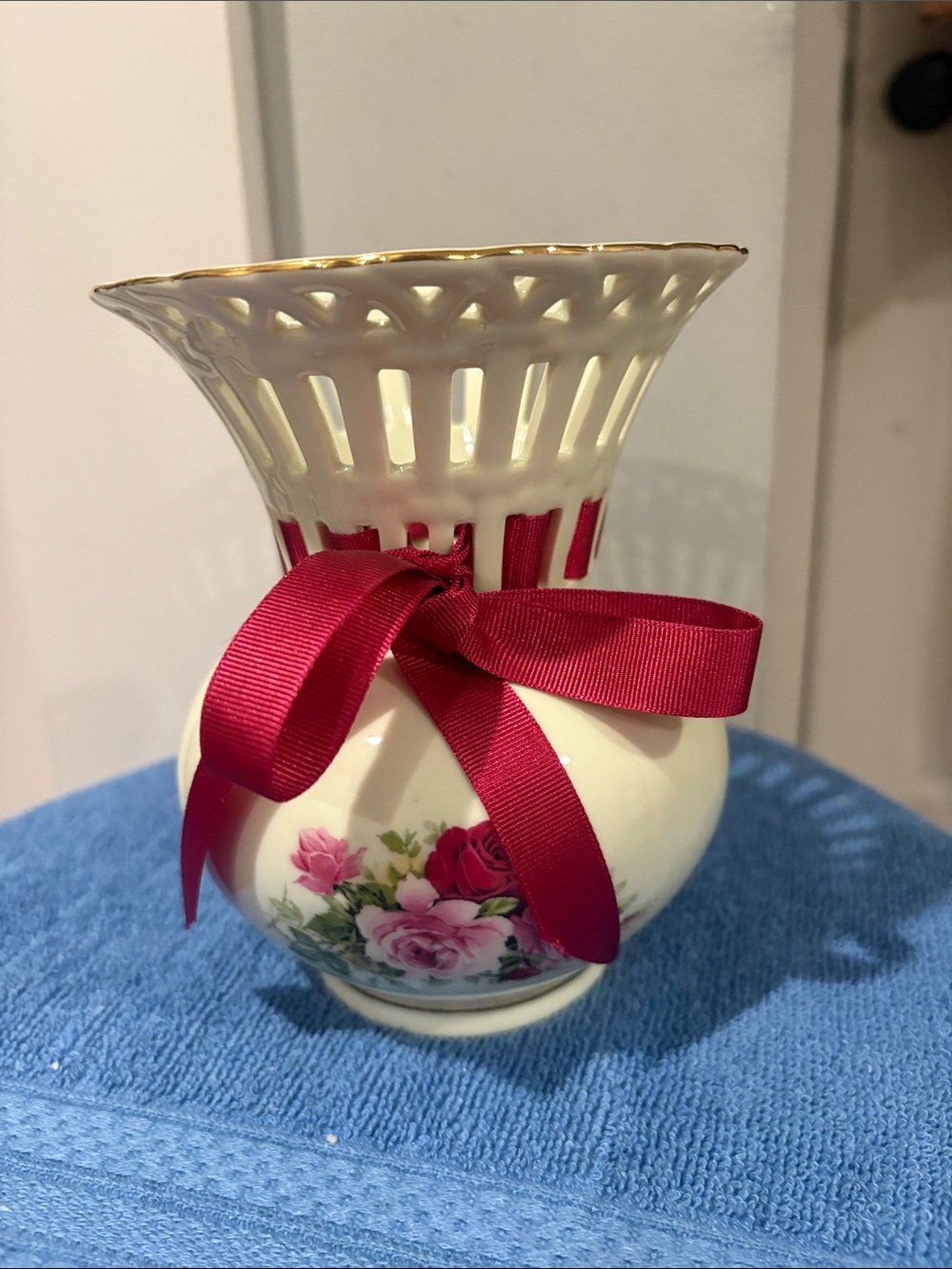 Cream Porcelain Floral Bud Vase with Pink Ribbon Accent